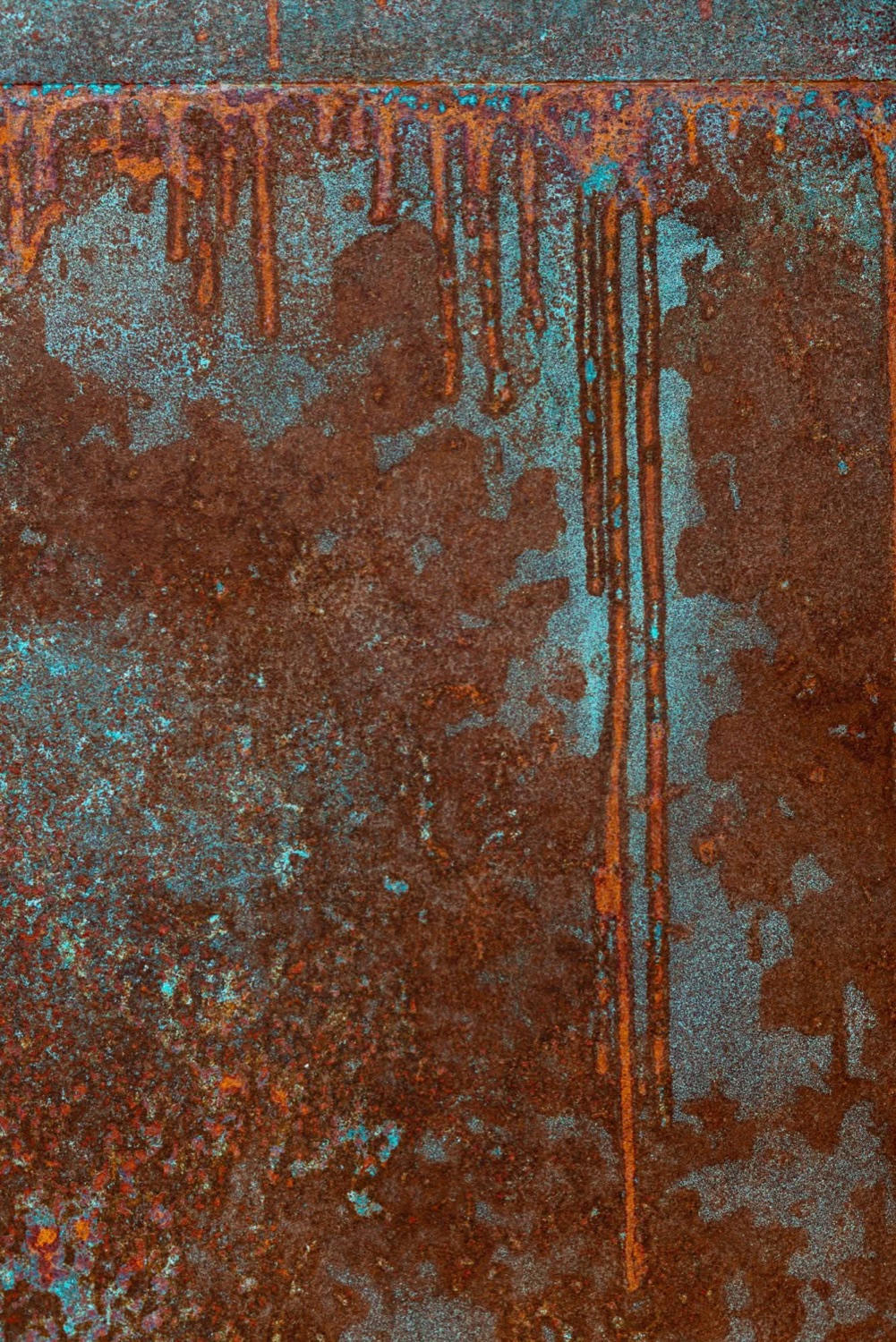 Textura de microcemento efecto óxido azul y naranja